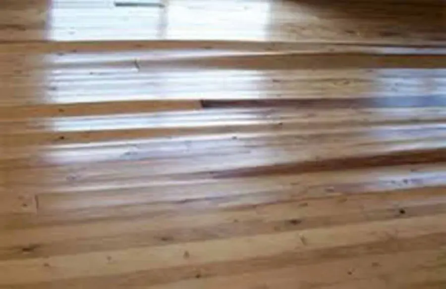 Hardwood floor boards cupping after water got under them in Canoga Park